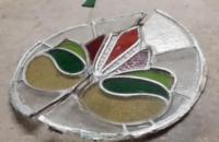 A badly damaged front door window